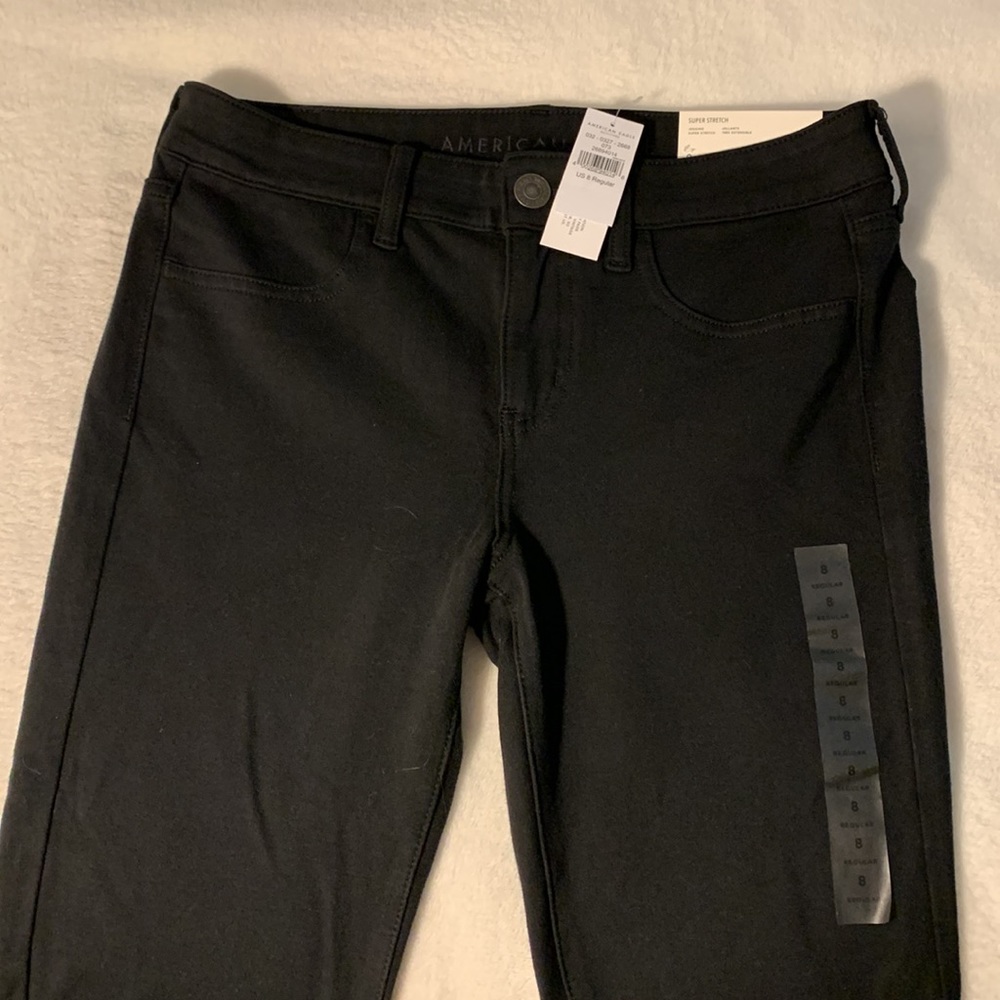 Women’s AE mid rise black jeggings